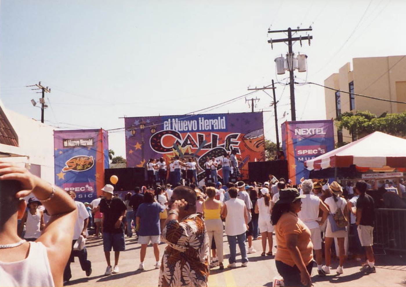 Crowd at Calle Ocho Festival in Miami — a diverse community gathering outdoors