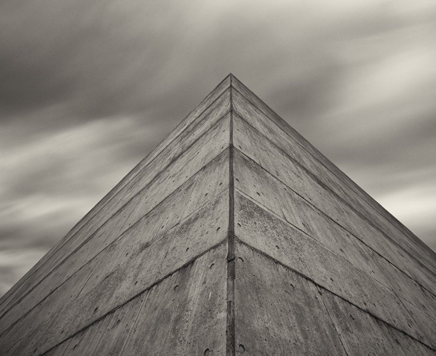 Fukushima sea wall — concrete architecture under overcast sky (Shigeru Yoshida)